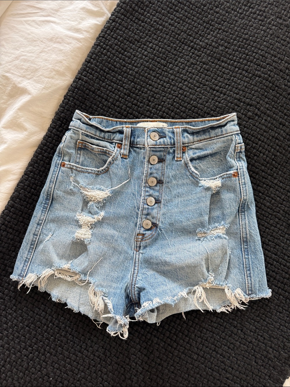 High-Rise Distressed Denim Shorts